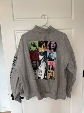 Official Taylor Swift The Eras Tour quarter zip sweatshirt crew zip in gray.